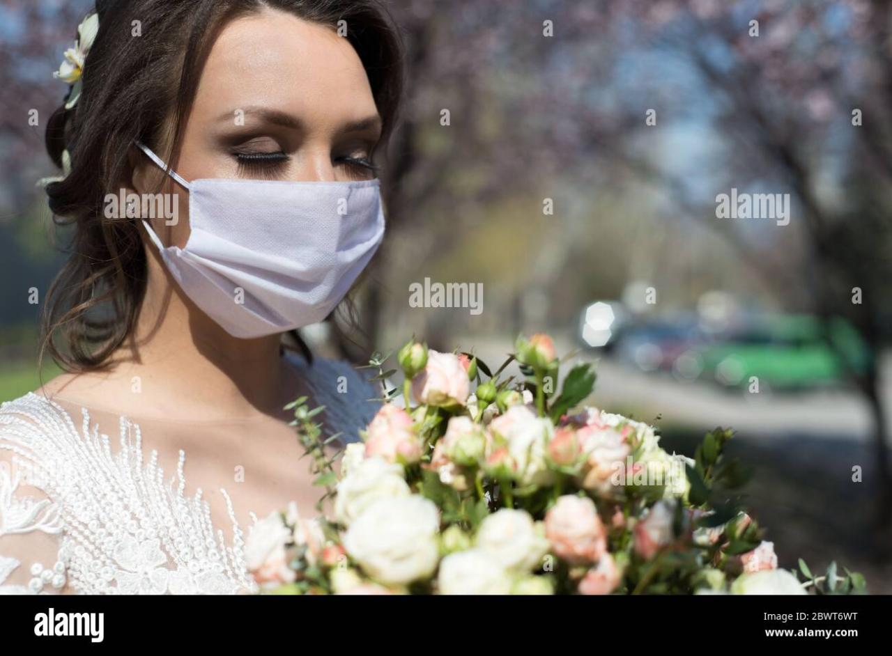 Masked bride. Wedding during the period of quarantine and pandemic ...